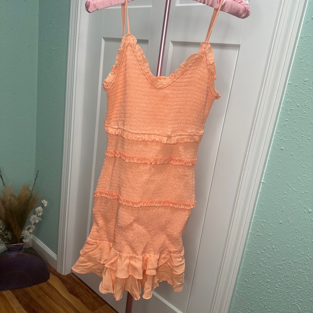 Olivaceous Coral Smocked ruffled mini dress size Medium fitted spring beach